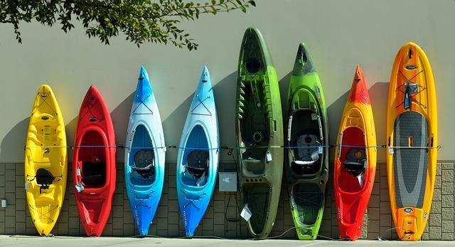 Different shapes, sizes, colours of beginer kayaks